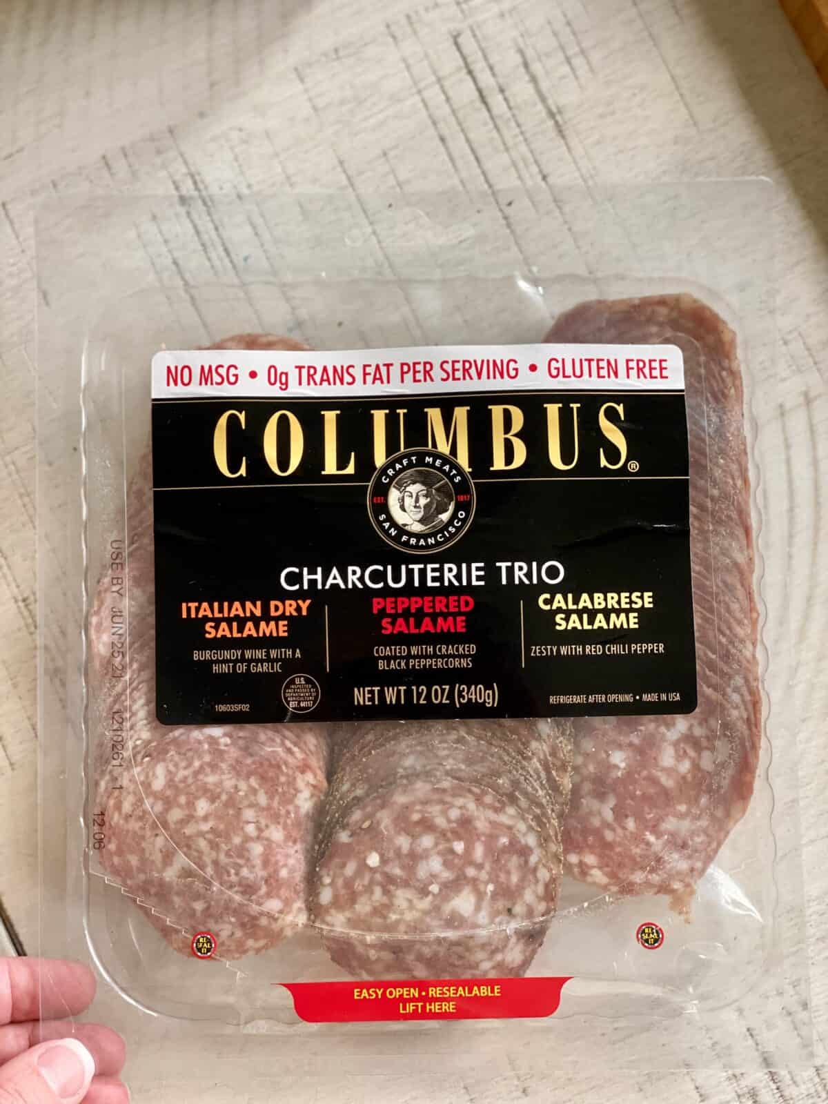 an unopened pack of columbus salami