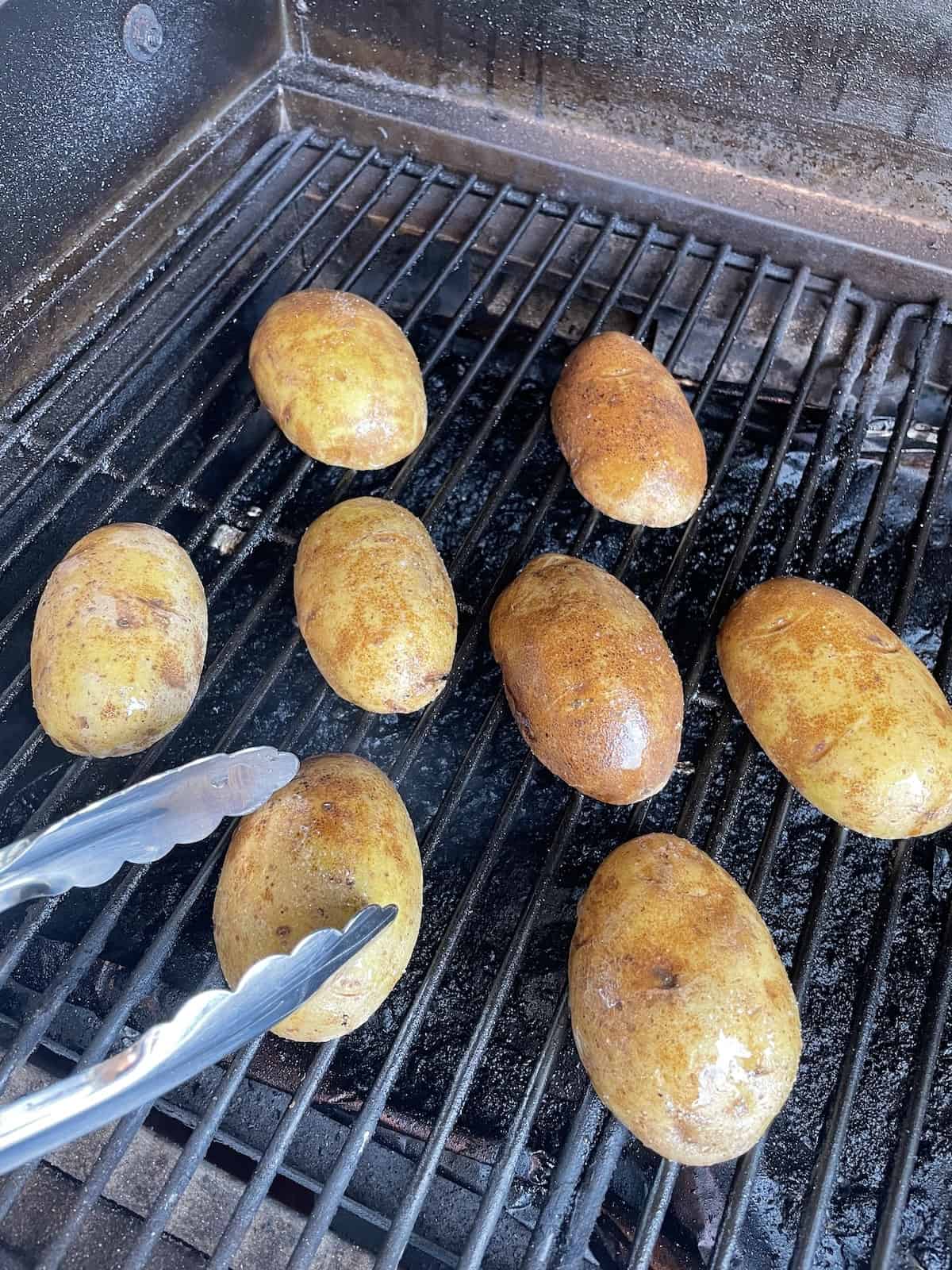 uncooked potato skins on grill