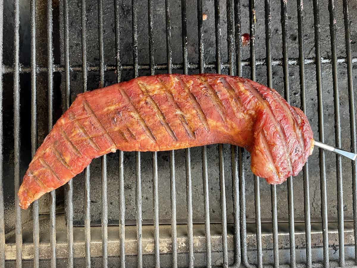 seasoned pork tenderloin on grill