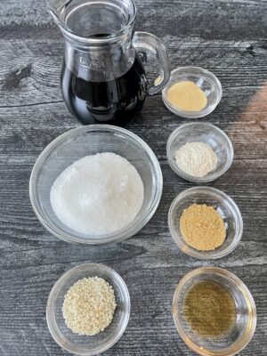 soyaki sauce ingredients including soy sauce sugar sesame seeds onion powder granulated garlic ginger powder and sesame oil