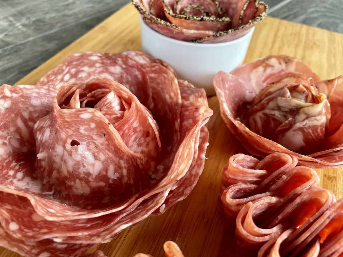 large and small salami slices folded in flowers