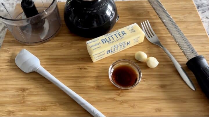 grey spatula mini food processor microplane and garlic butter ingredients