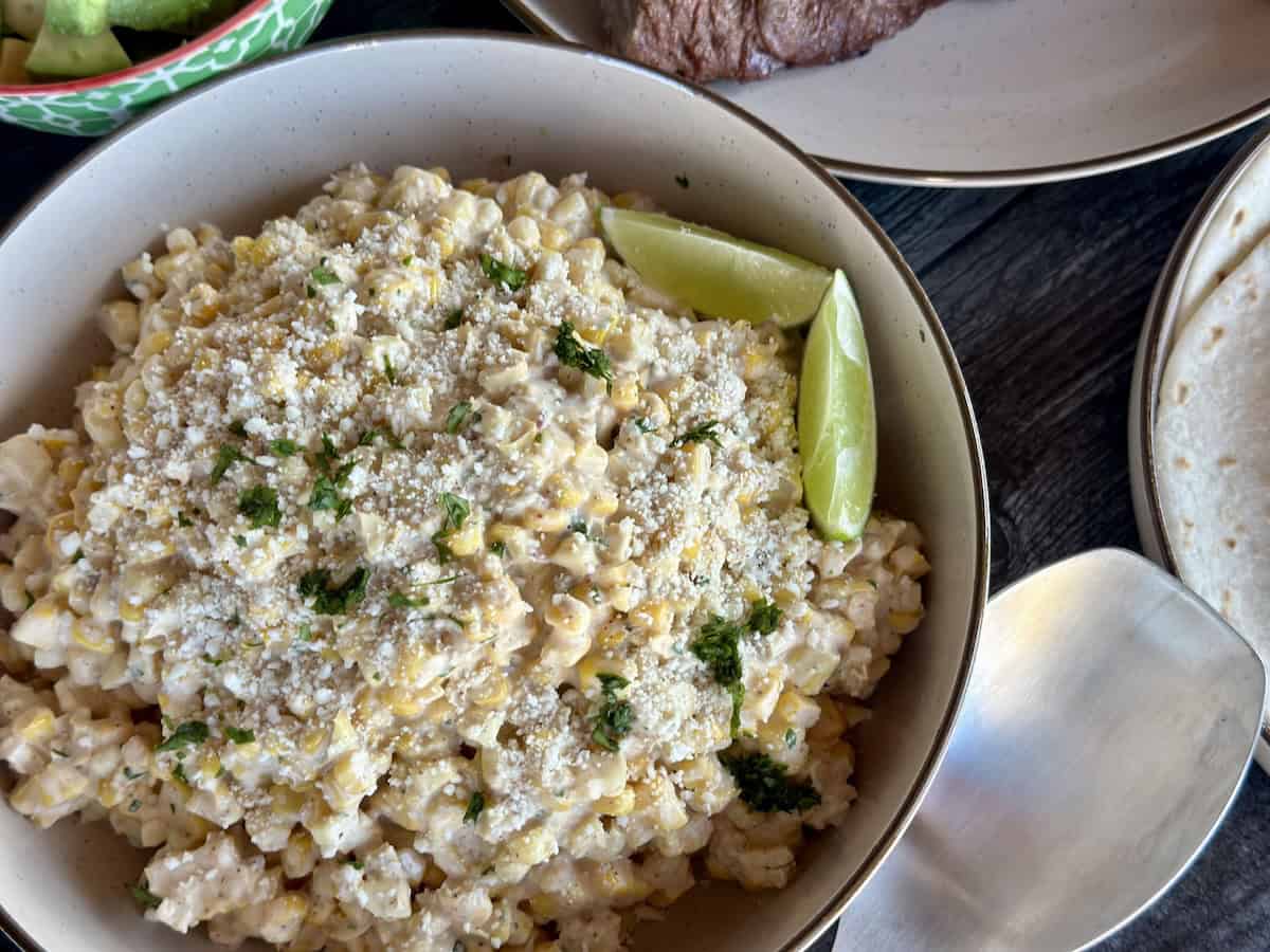 grilled elope salad in tan bowl