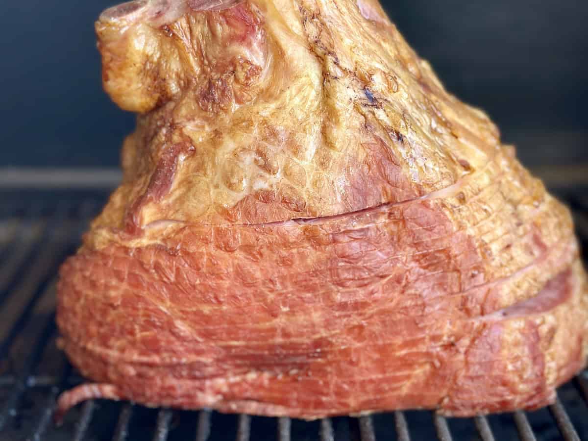 spiral ham on grill grates of pellet smoker