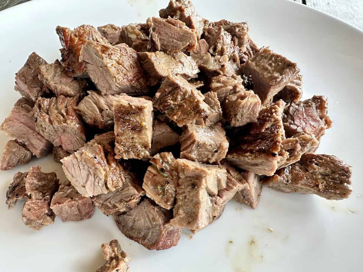 diced carne asada on plate