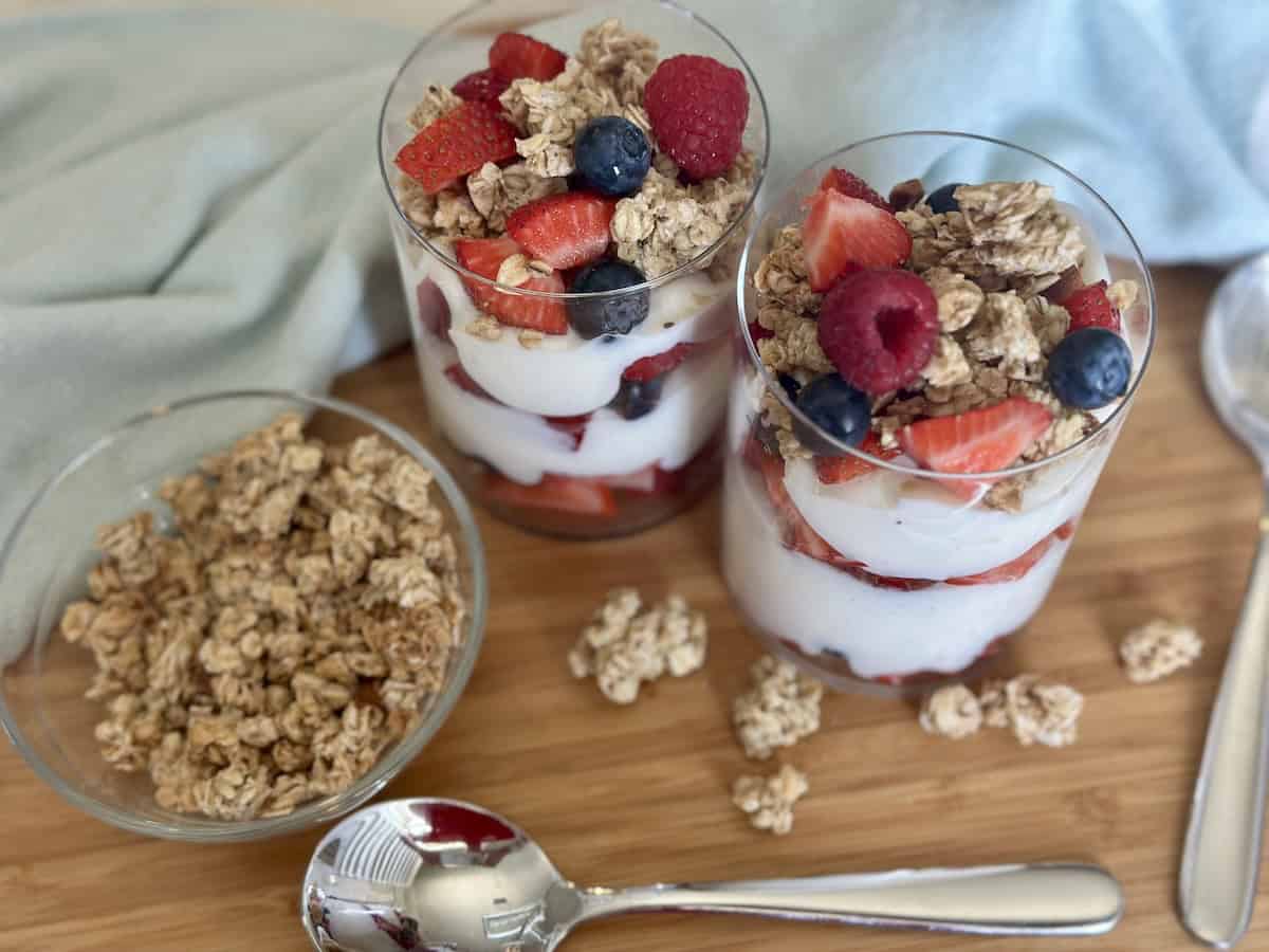 fruit and yogurt parfaits in tall glasses