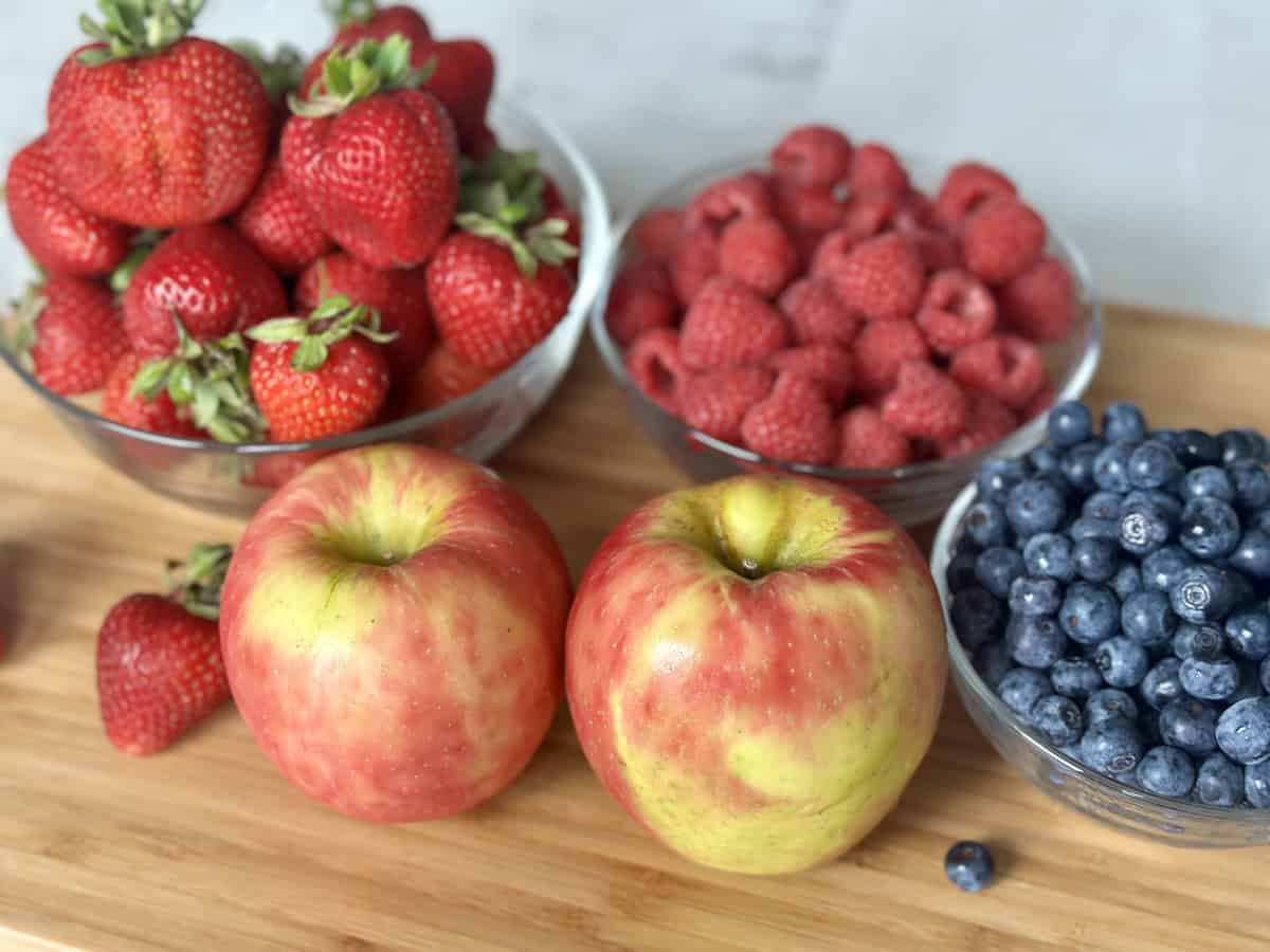 fruit on wood cutting board