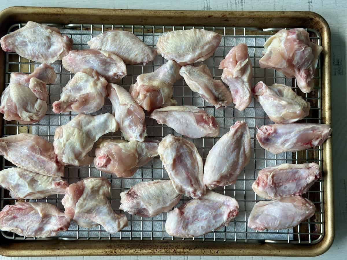 saw chicken wings on sheet pan lined with wire rack