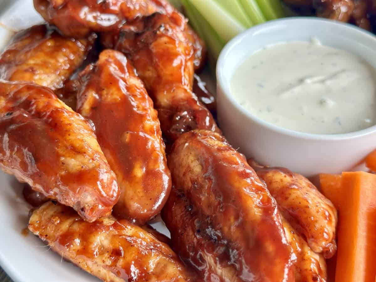 hot wings in white dish with ranch dip