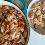 teal pot with jambalaya next white bowl of jambalaya