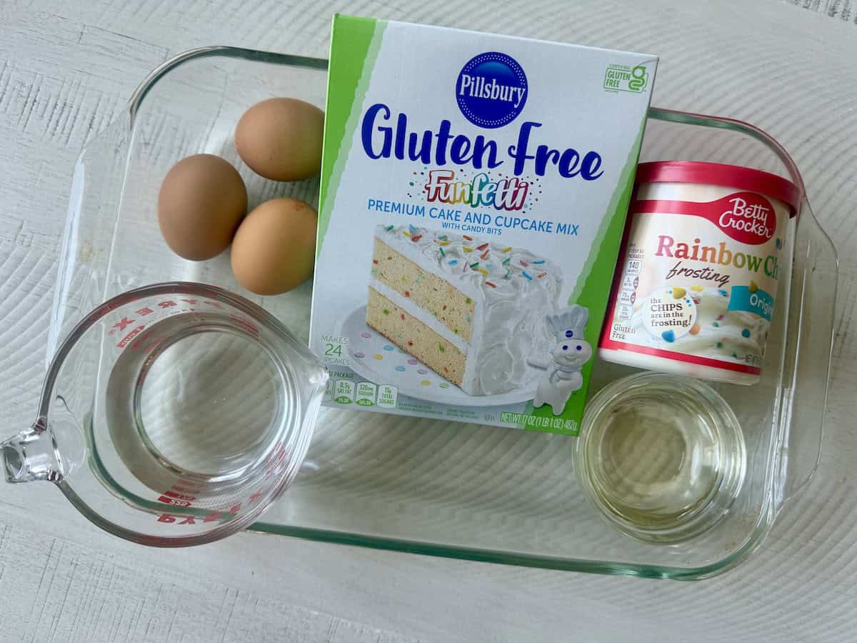 boxed cake mix eggs water oil and jarred frosting in glass baking dish