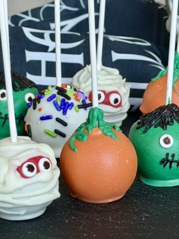 halloween cake pops on black board