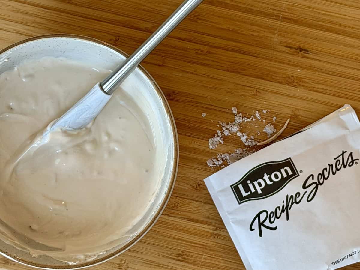 bowl of onion dip spatula soup packet