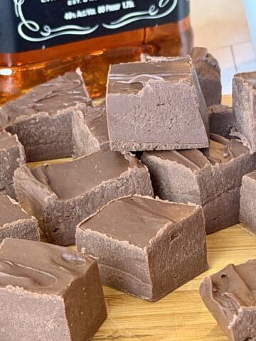 whiskey fudge squares wood cutting board bottle of jack Daniels