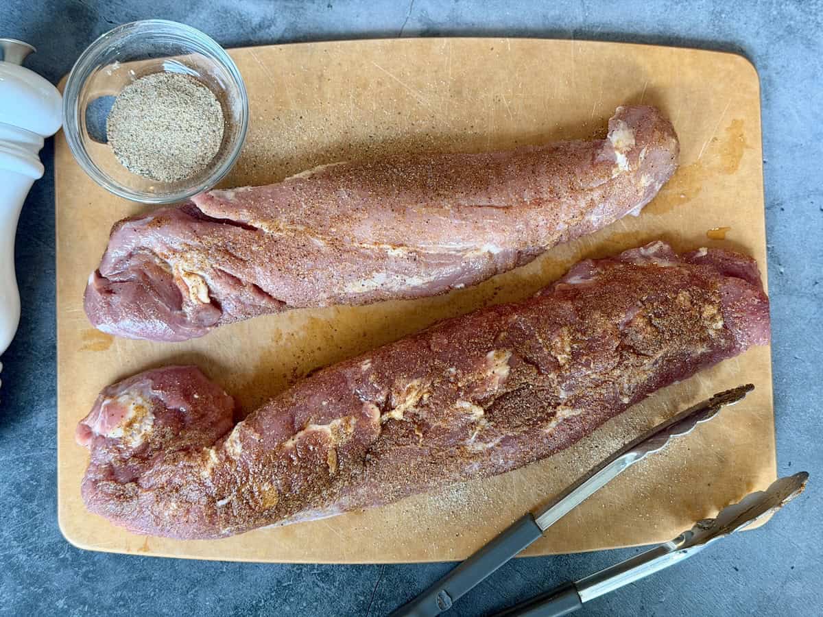 2 seasoned pork tenderloins wood cutting board bowl os seasoning 