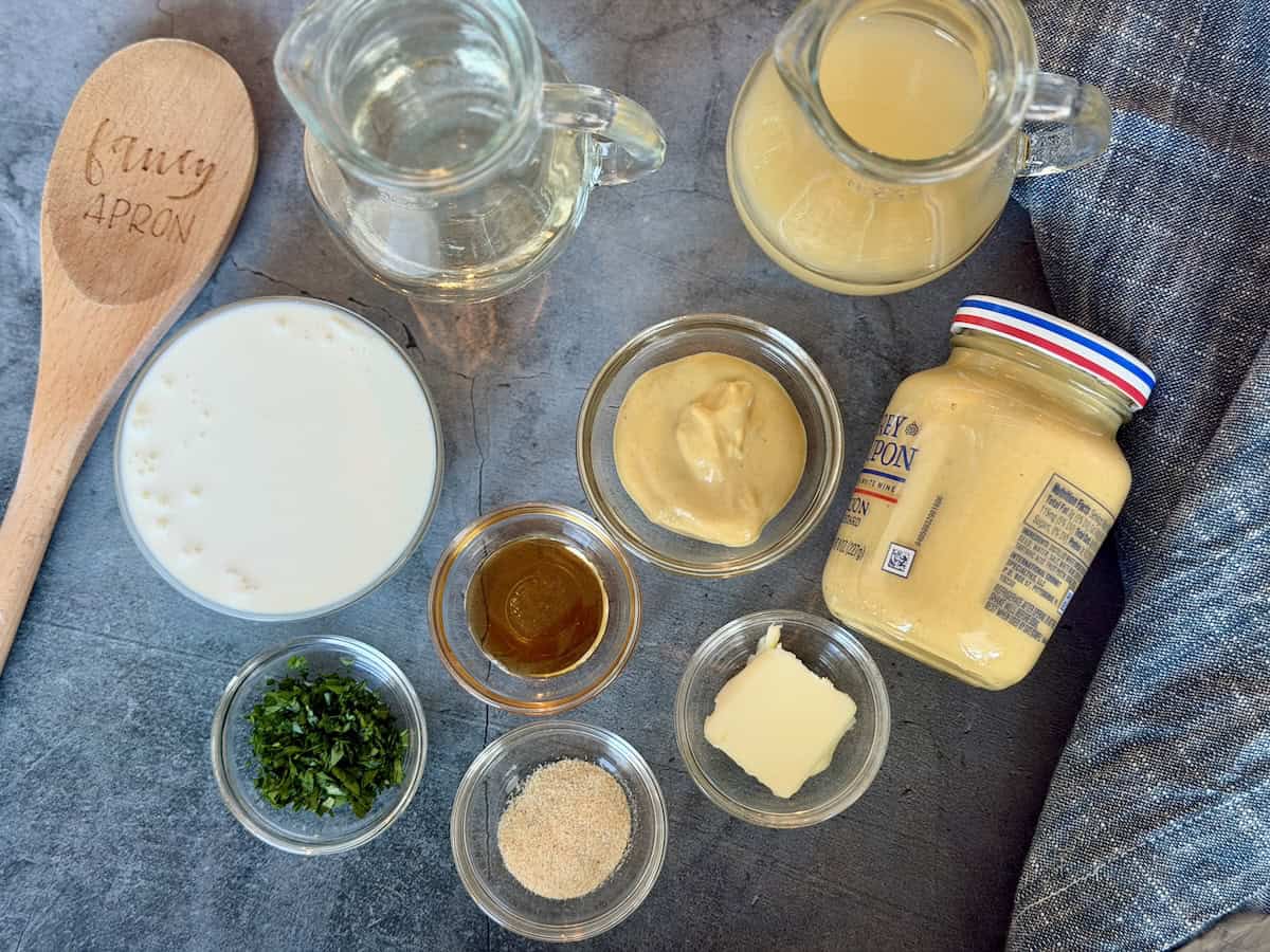 creamy msuatrd sauce ingredients measured in glass bowls