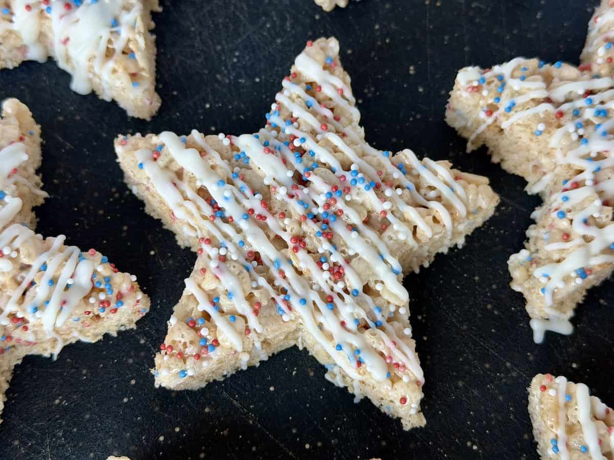 star shaped Rice Krispie treat with white chocolate and sprinkles
