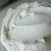 glass bowl of homemade vanilla frosting