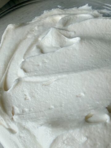 glass bowl of homemade vanilla frosting
