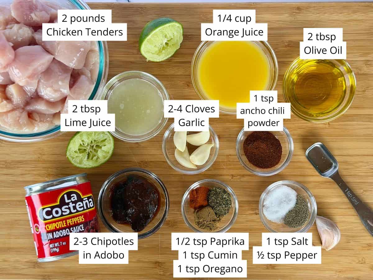 chipotle chicken marinade ingredients in small glass bowls and cut uncooked chicken tenders